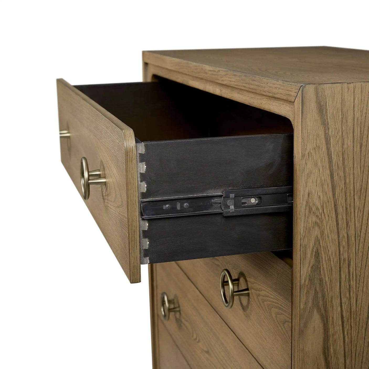 Wooden dresser with open drawer and metal ring pulls in close-up view