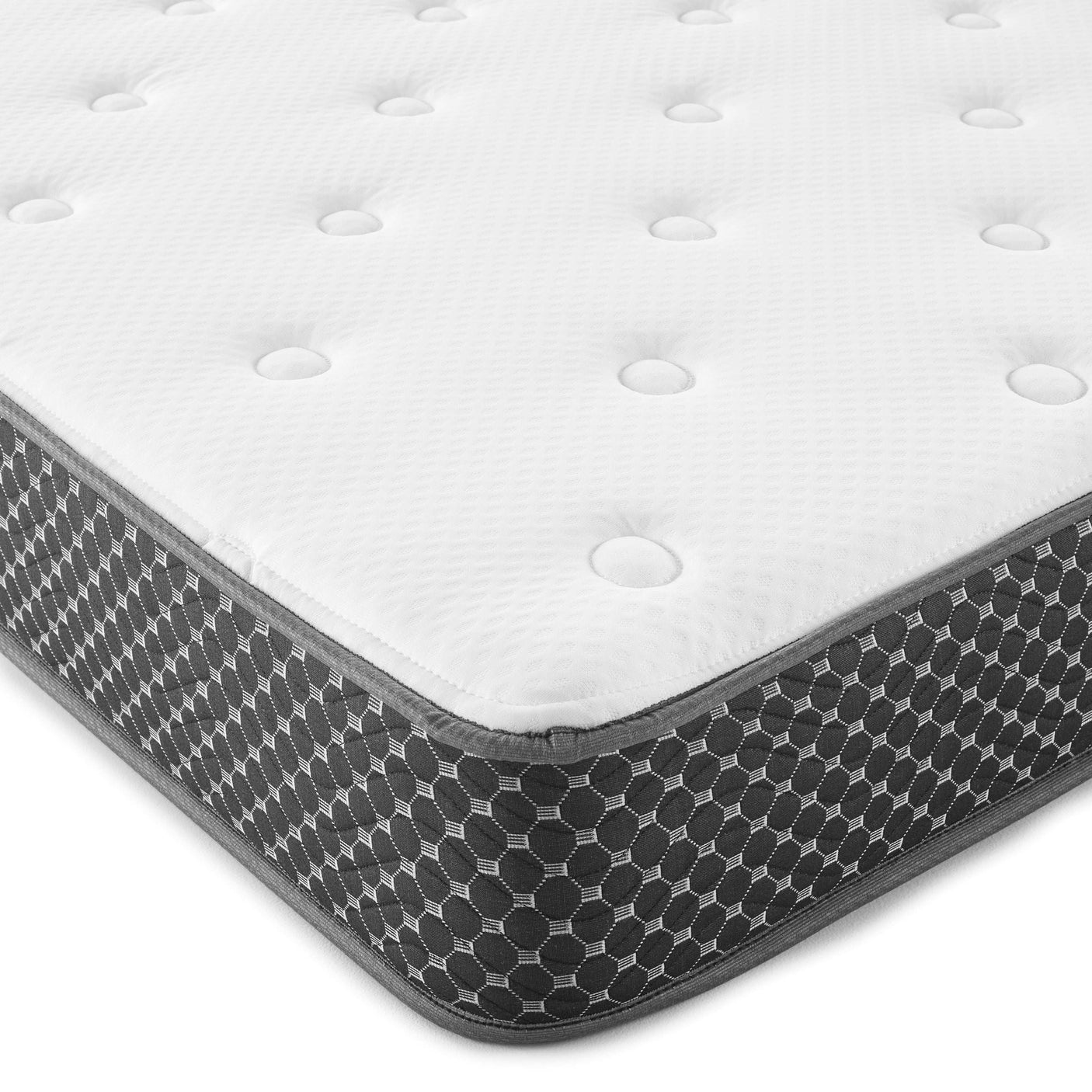 Comfortable white and gray memory foam mattress with tufted top and hexagonal patterned sides