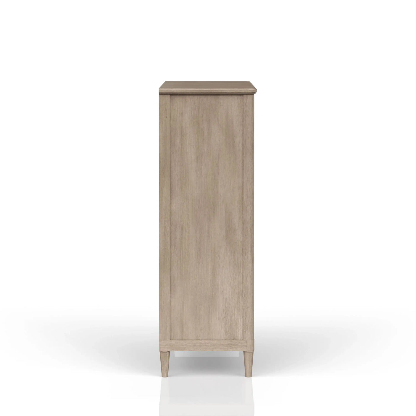 Side view of light wood dresser with tapered legs on white background