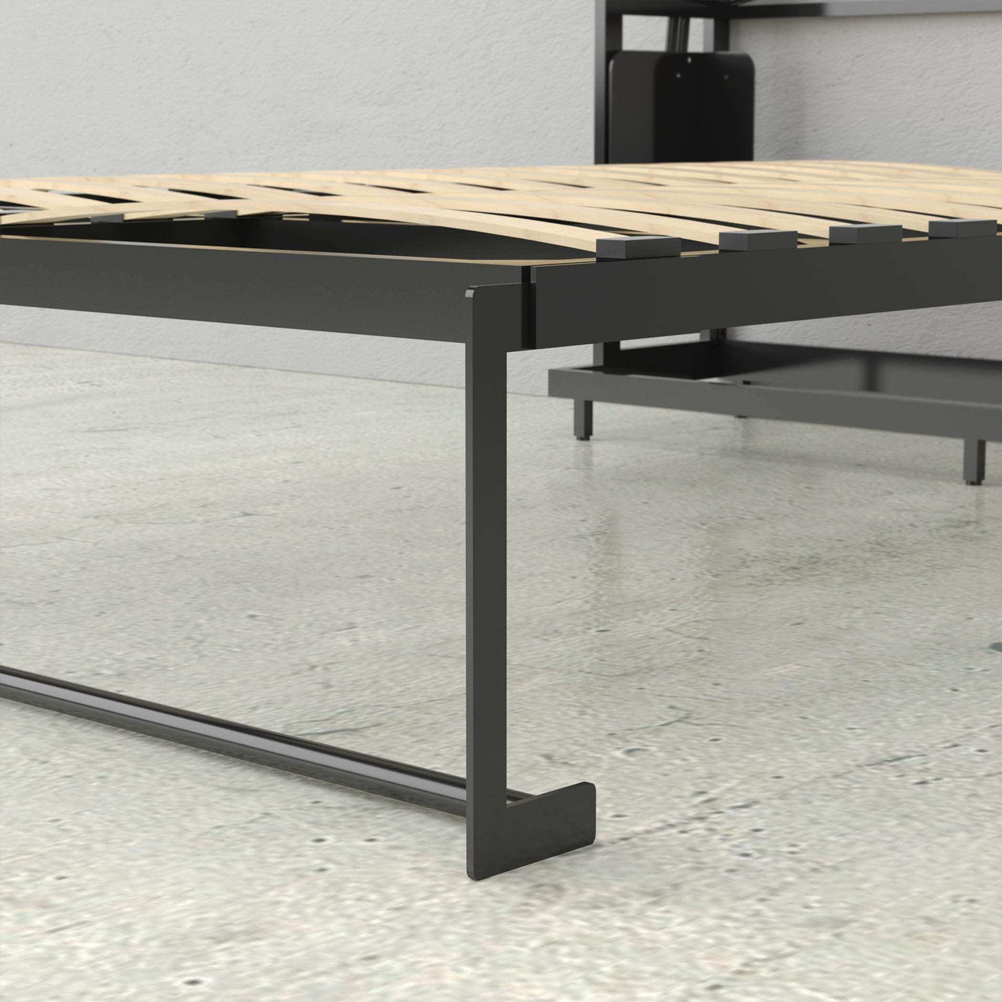 Modern metal platform bed frame with wood slats on a concrete floor