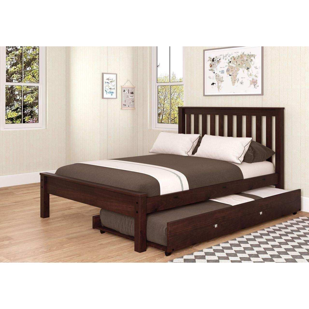 Dark wood full bed with trundle in bright bedroom, geometric rug, and wall art
