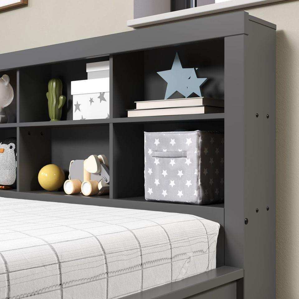 Dark gray full daybed with bookcase shelves, star decor, storage bin, and toys in bedroom