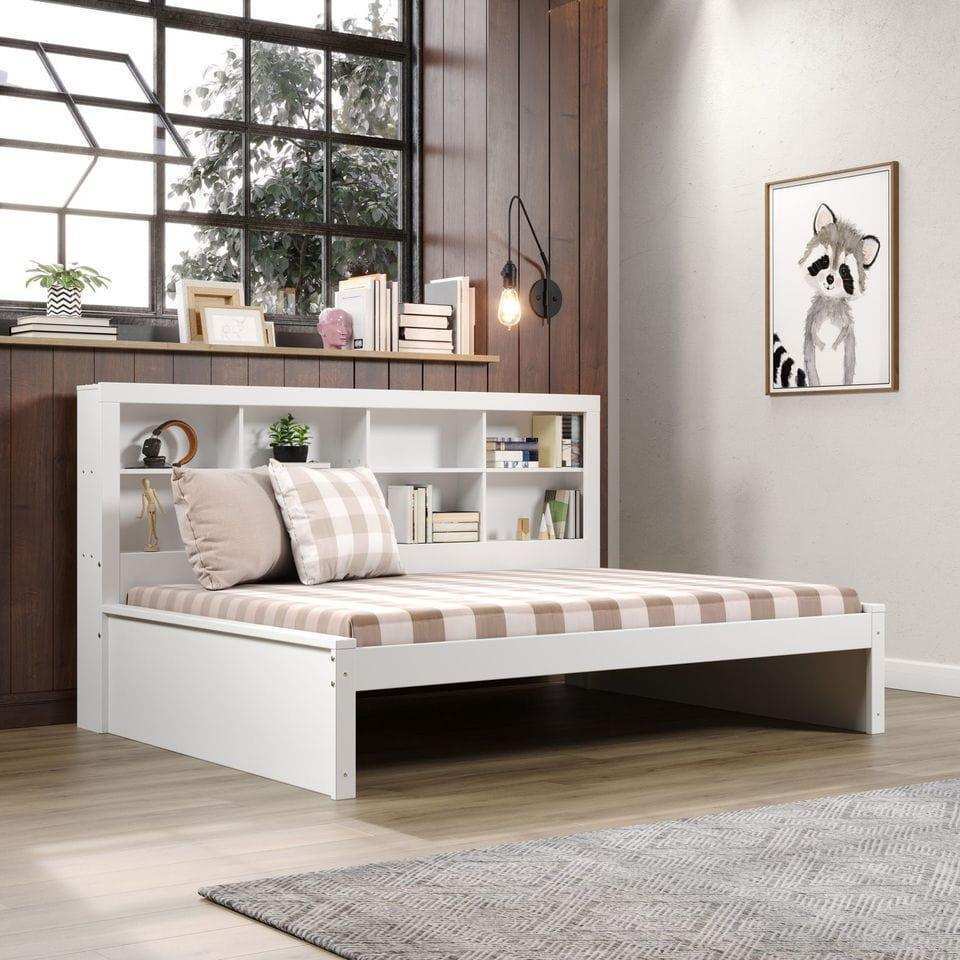 White full daybed with bookcase headboard in modern bedroom, plaid bedding, wall art, large window