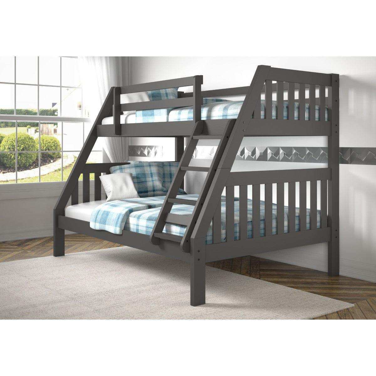 Dark gray twin over full bunk bed with plaid bedding in a bright bedroom with large window
