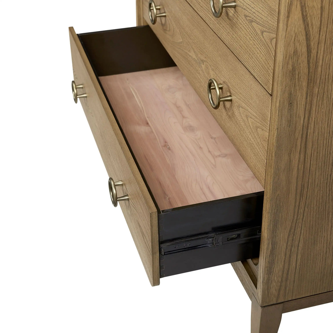 Open wooden dresser drawer with metal handles and dovetail joinery, closeup view