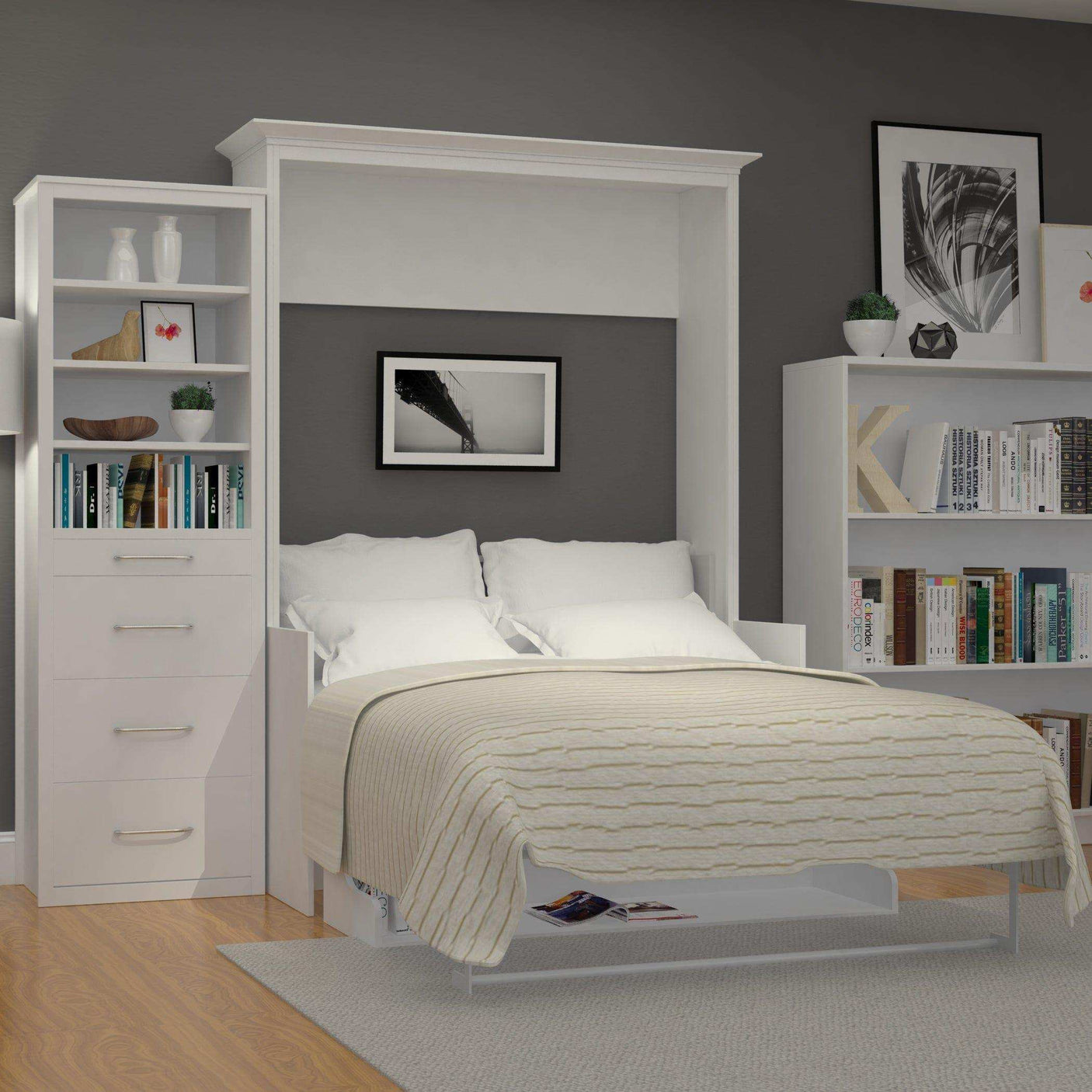 White vertical Murphy bed with desk and side tower storage in modern bedroom