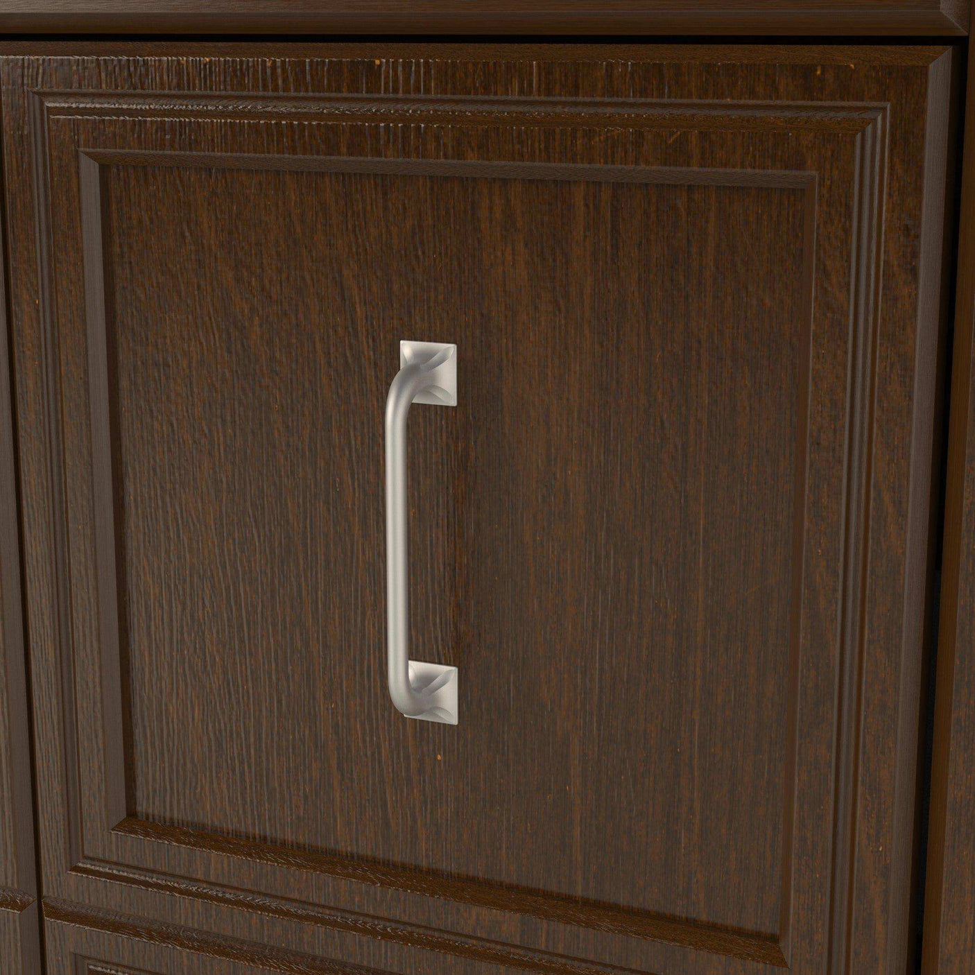 Close-up of walnut Murphy bed headboard with silver handle and panel detailing