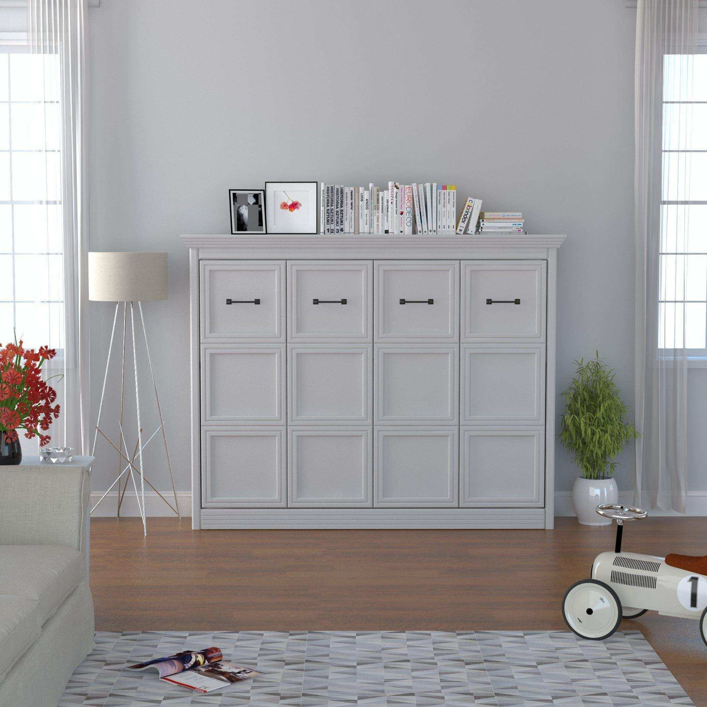 White horizontal murphy bed with books and decor in modern living room