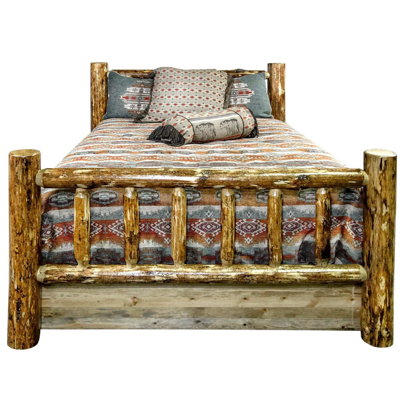 Rustic log bed with patterned bedding and decorative pillows, Glacier Country Collection
