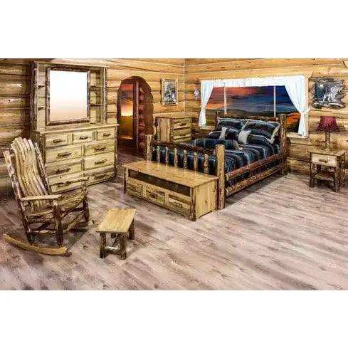 Rustic log cabin bedroom set with log bed, dresser, nightstand, and wood rocking chair