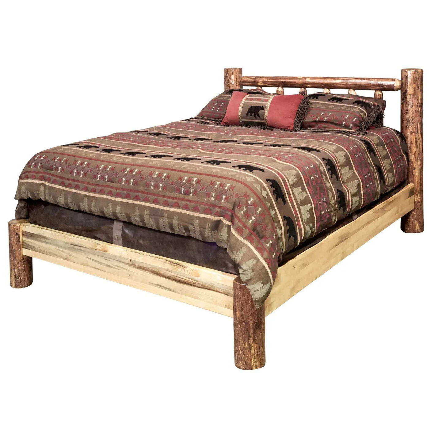 Rustic log platform bed with patterned bedding and bear motifs, Glacier Country Collection.