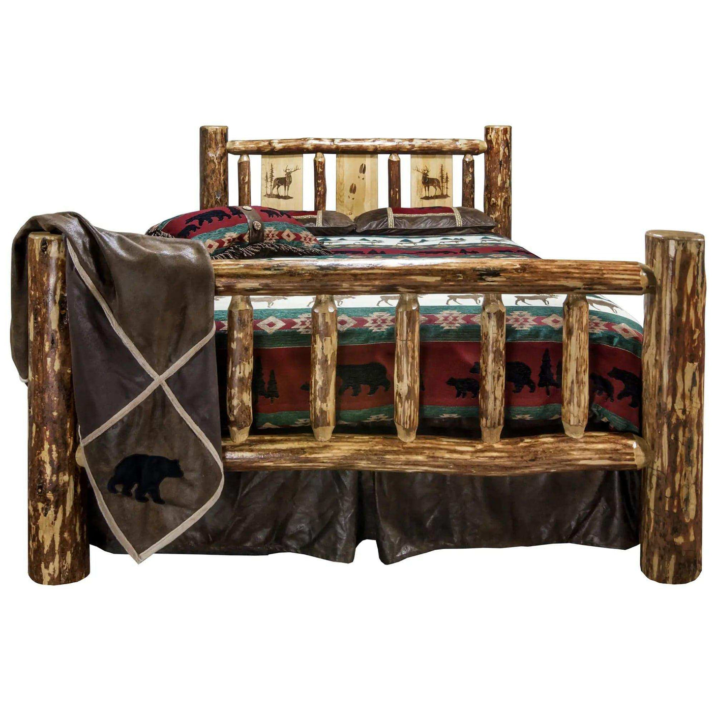 Rustic king bed with engraved wildlife designs, log frame, and bear-themed bedding
