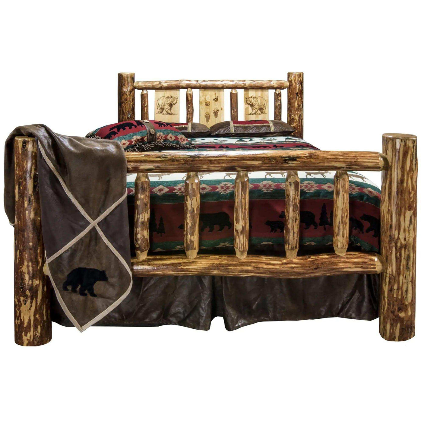Rustic king bed with log frame and laser-engraved bear and pine bedding, lodge style