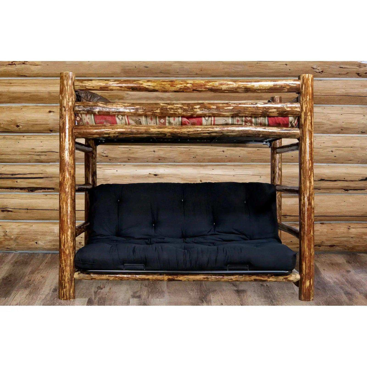 Rustic log twin bunk bed over full black futon in a cabin-style bedroom with wood walls