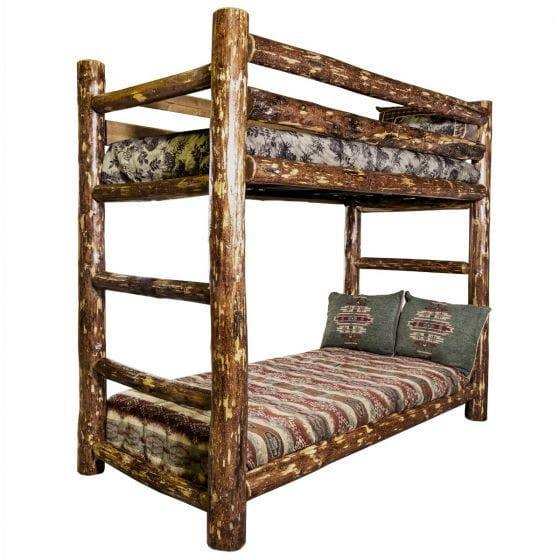 Rustic log twin over twin bunk bed with patterned bedding and throw pillows