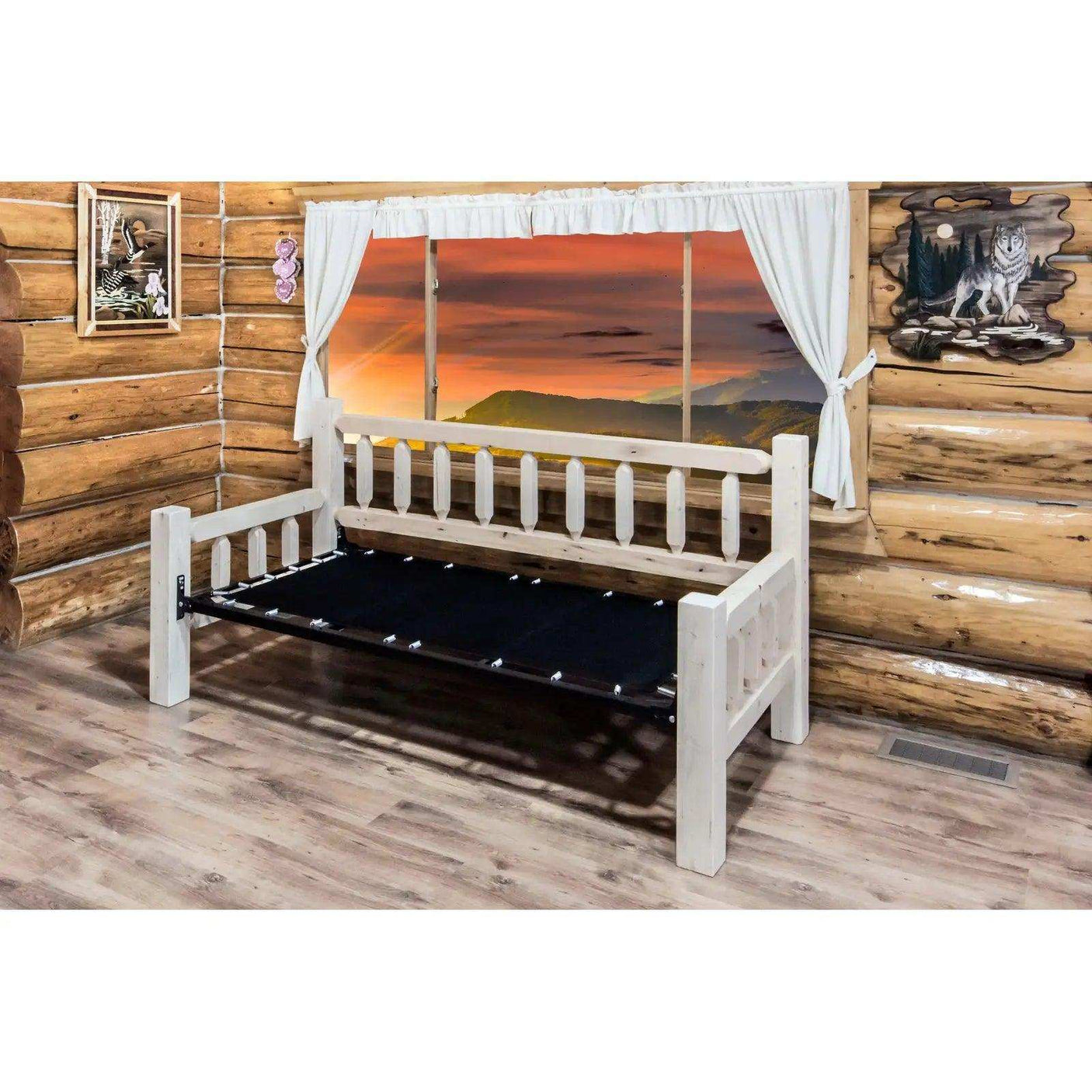 Homestead Collection daybed with clear lacquer finish in rustic log cabin bedroom
