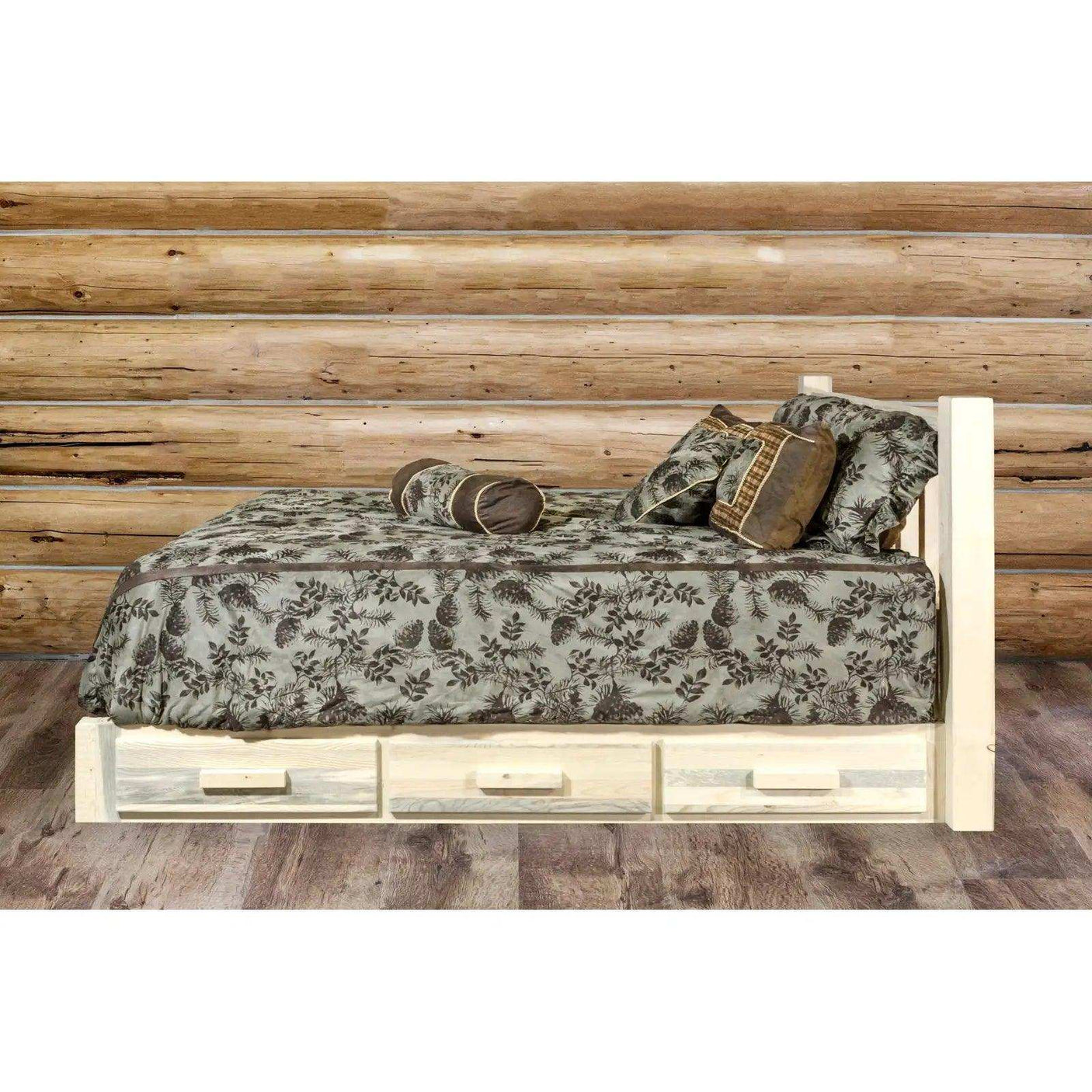 Rustic full platform bed with storage drawers, floral bedding, log cabin wall background