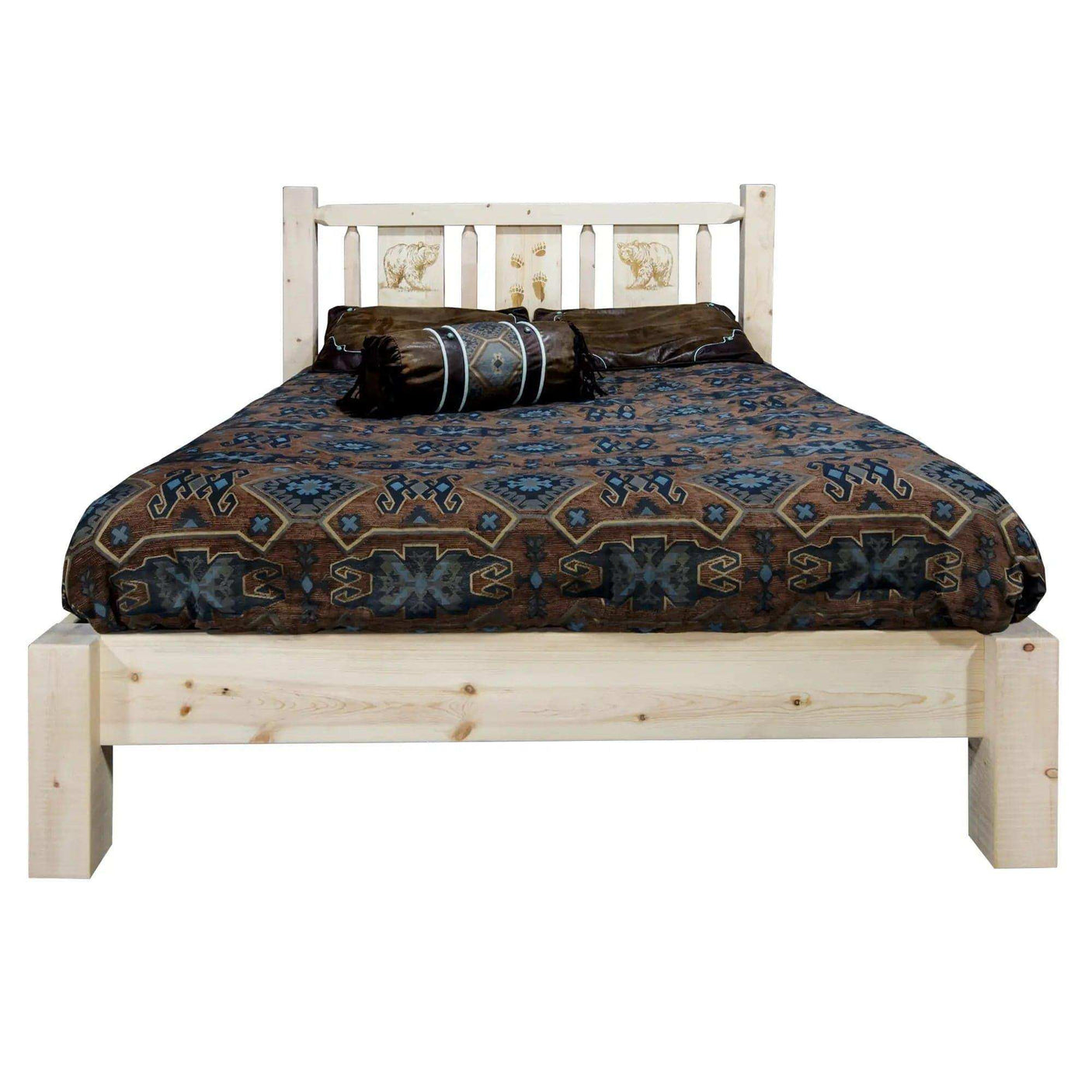 Rustic king platform bed with laser-engraved bear headboard and geometric bedding
