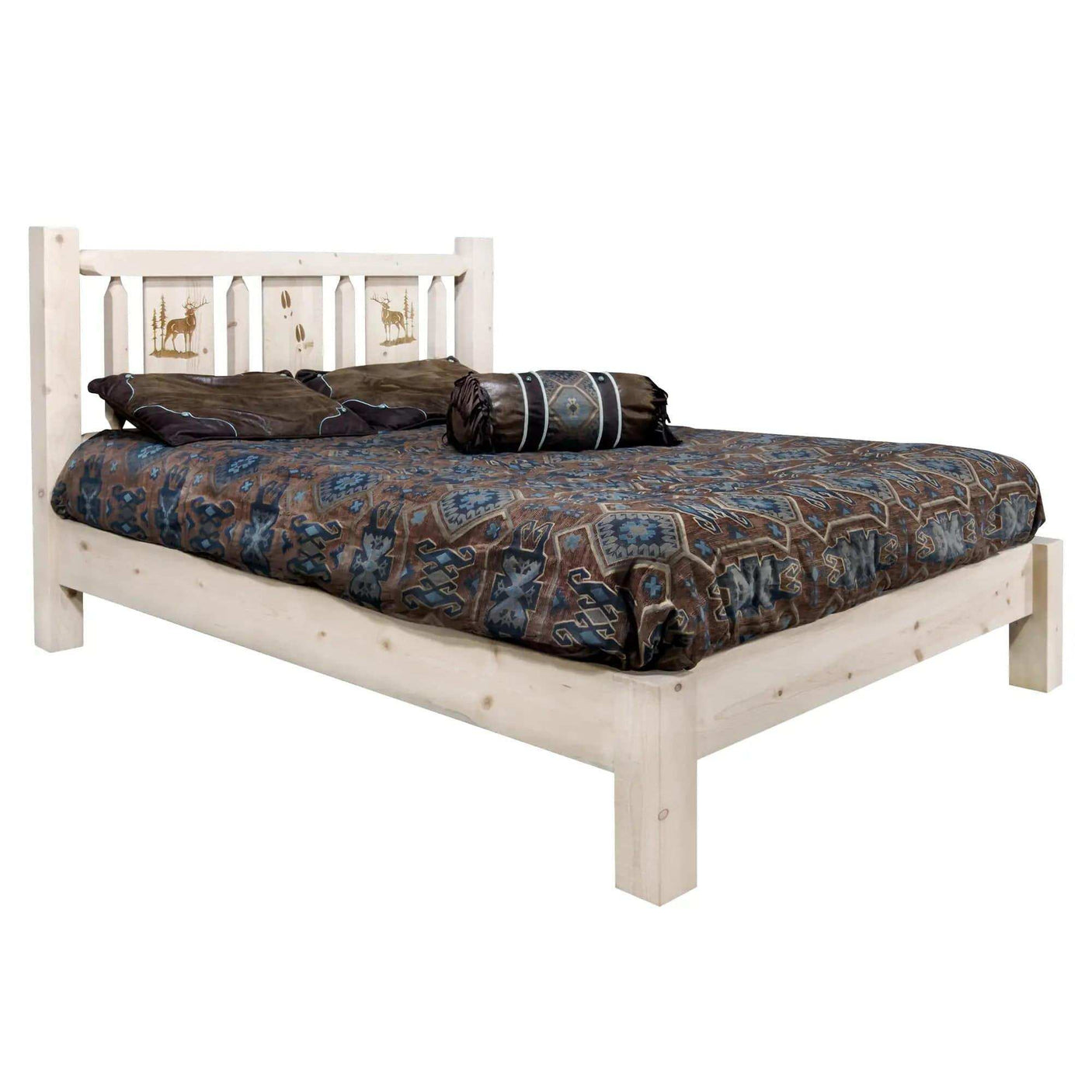 Queen platform bed with rustic white wood frame, laser-engraved wildlife headboard, and patterned bedding