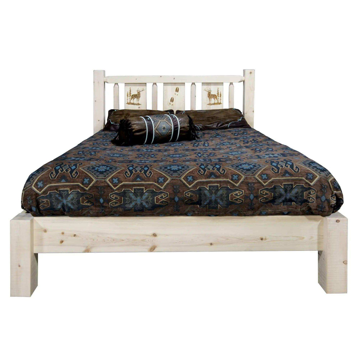 Rustic queen platform bed with laser-engraved wildlife headboard and southwestern bedding