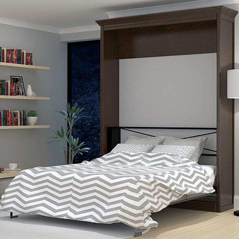 Queen Murphy bed in walnut finish, open in modern bedroom with zigzag bedding, wall shelves.