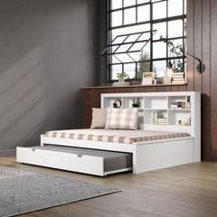 Daybed with underbed trundle and a bookcase for the headboard