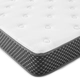 Comfortable white and gray memory foam mattress with tufted top and hexagonal patterned sides