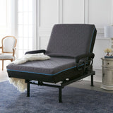Adjustable grey hospital style bed with blue trim and armrests in a bright bedroom setting