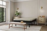 Modern bedroom with memory foam mattress, wood benches, beige walls, and decorative lighting