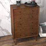 Mid-century modern wooden dresser with five drawers, decor accents, on wood flooring