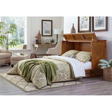 Arason Kingston queen cabinet bed with wicker inlays in amber honey in a stylish bedroom