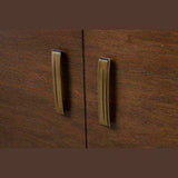 Close-up of Arason Pekoe cabinet bed brown wood handles bedroom furniture