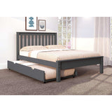 Gray wooden full bed with trundle in bright carpeted bedroom, large windows, wall art