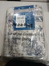 Beige & Dark Blue Patterned Area Rug – 5' × 7'