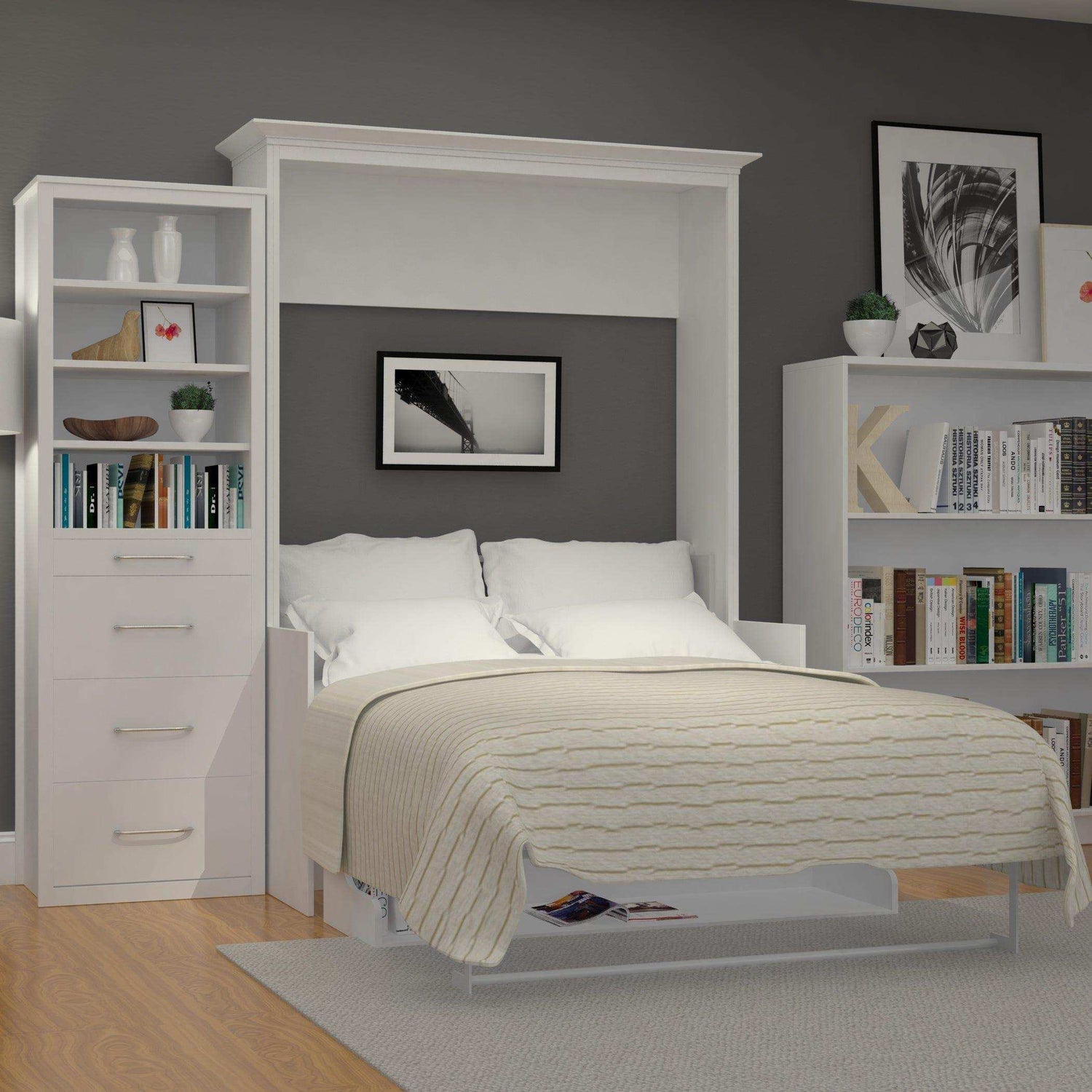 White vertical Murphy bed with desk and side tower storage in modern bedroom
