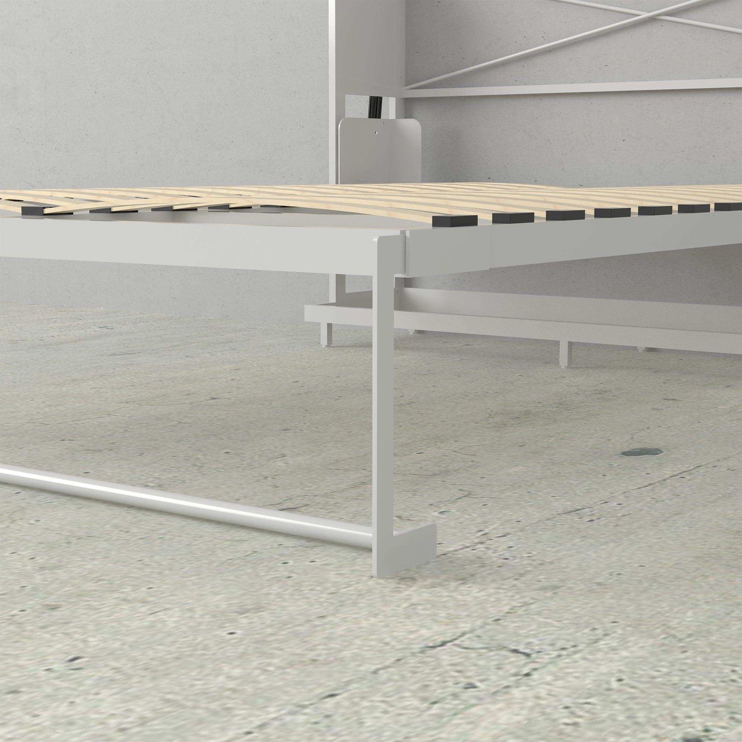 White vertical Murphy bed frame with wooden slats in a modern minimalist room