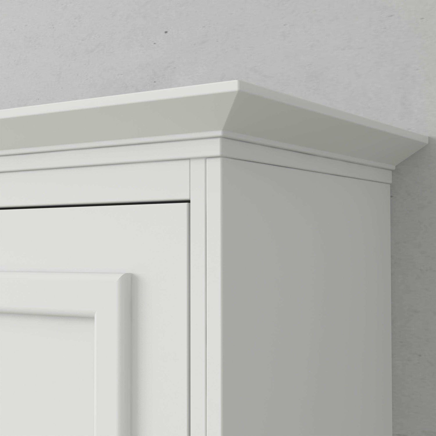 White vertical Murphy bed cabinet with crown molding detail against gray wall