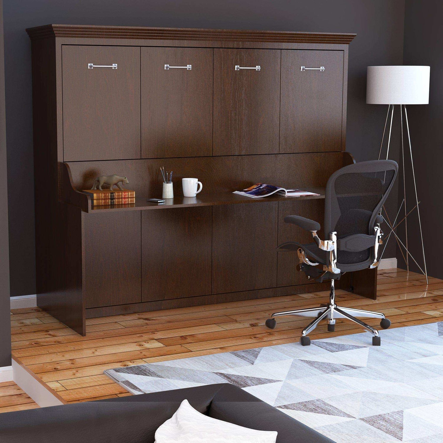 Modern walnut queen Murphy bed with desk, ergonomic chair, and floor lamp in home office